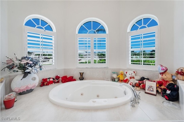 2871 Bracci Dr, Saint James City, FL 33956 - bathroom with a tub with jets