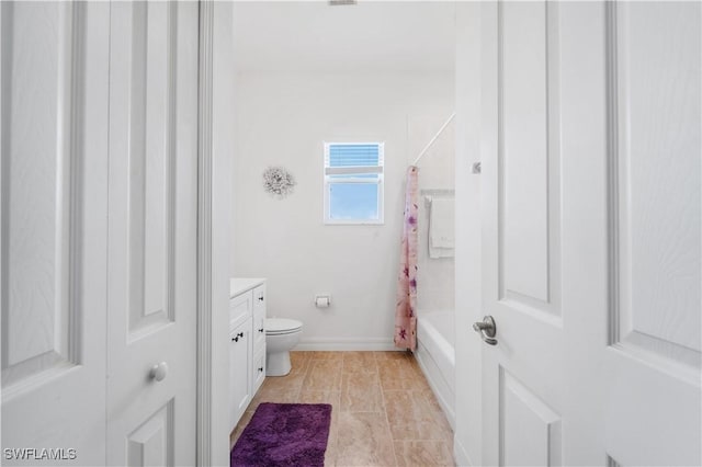 2871 Bracci Dr, Saint James City, FL 33956 - bathroom with toilet, shower / bathtub combination with curtain, vanity, and baseboards