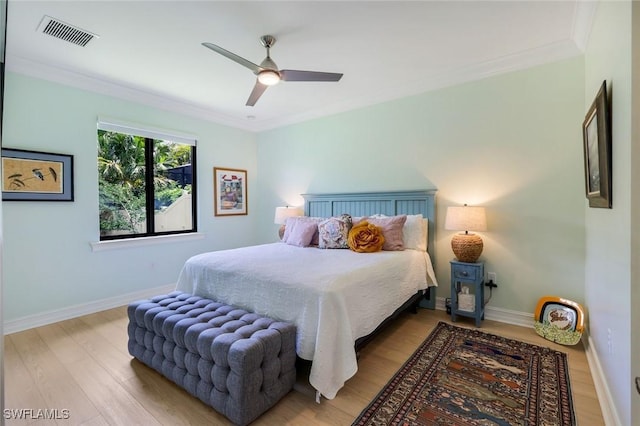 26304 Prince Pierre Way, Bonita Springs, FL 34135 - bedroom with light wood-style floors, ornamental molding, and ceiling fan