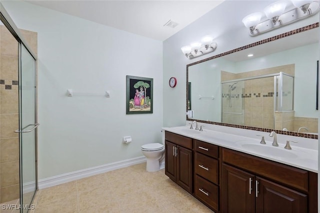 26304 Prince Pierre Way, Bonita Springs, FL 34135 - full bath featuring double vanity, a shower stall, toilet, and tile patterned flooring