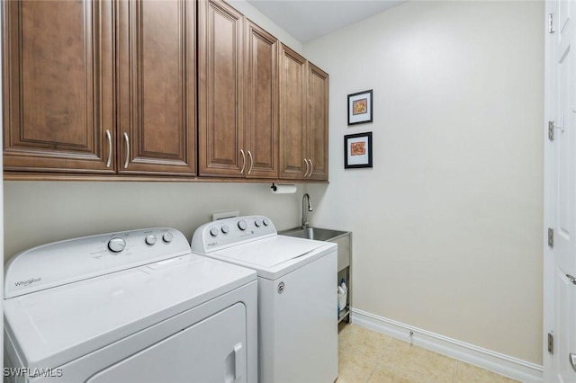 26304 Prince Pierre Way, Bonita Springs, FL 34135 - washroom with cabinet space, washing machine and clothes dryer, and light tile patterned floors
