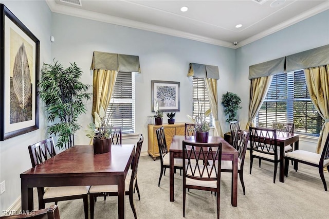 26304 Prince Pierre Way, Bonita Springs, FL 34135 - dining area featuring light colored carpet, ornamental molding, recessed lighting, and baseboards