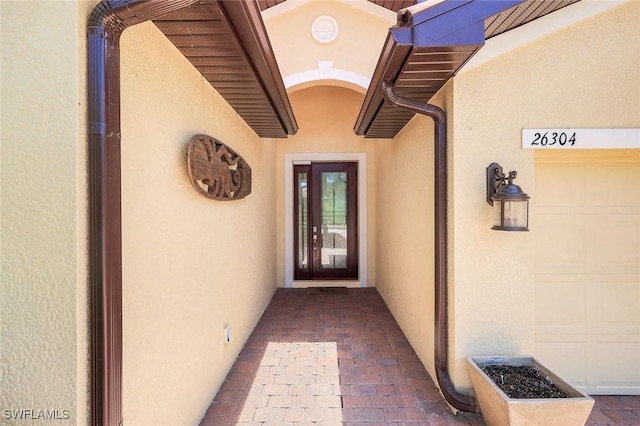 26304 Prince Pierre Way, Bonita Springs, FL 34135 - entrance to property with stucco siding