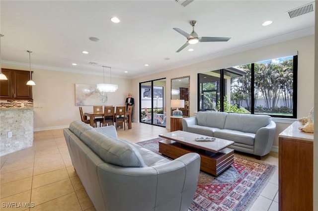 26304 Prince Pierre Way, Bonita Springs, FL 34135 - living room featuring light tile patterned floors, ornamental molding, recessed lighting, a ceiling fan, and baseboards