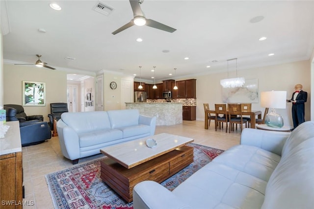 26304 Prince Pierre Way, Bonita Springs, FL 34135 - living room with a ceiling fan, light tile patterned floors, recessed lighting, and ornamental molding