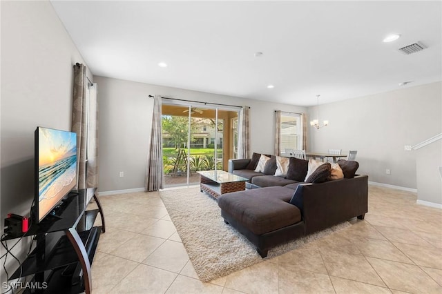 10844 Alvara Point Dr, Bonita Springs, FL 34135 - living room featuring a chandelier, light tile patterned flooring, baseboards, and recessed lighting