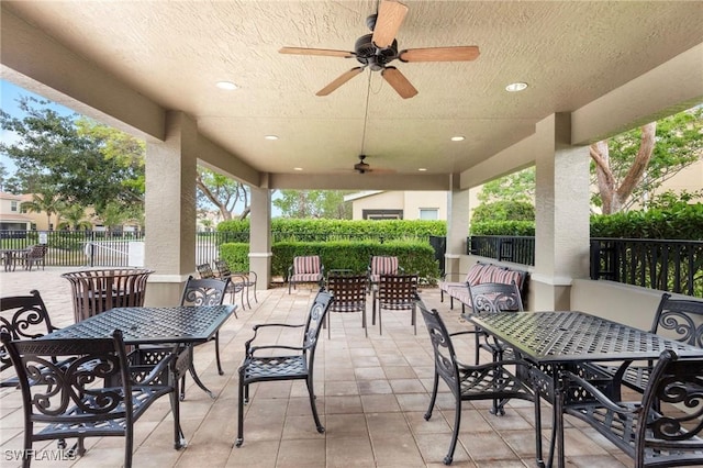 10844 Alvara Point Dr, Bonita Springs, FL 34135 - view of patio / terrace featuring outdoor dining space and ceiling fan