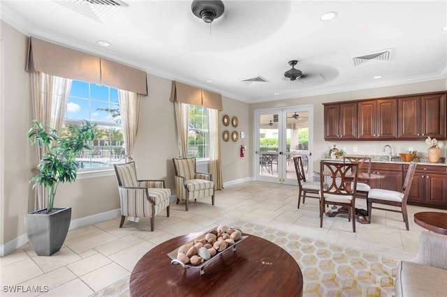 10844 Alvara Point Dr, Bonita Springs, FL 34135 - living area with ceiling fan, baseboards, crown molding, recessed lighting, and light tile patterned floors