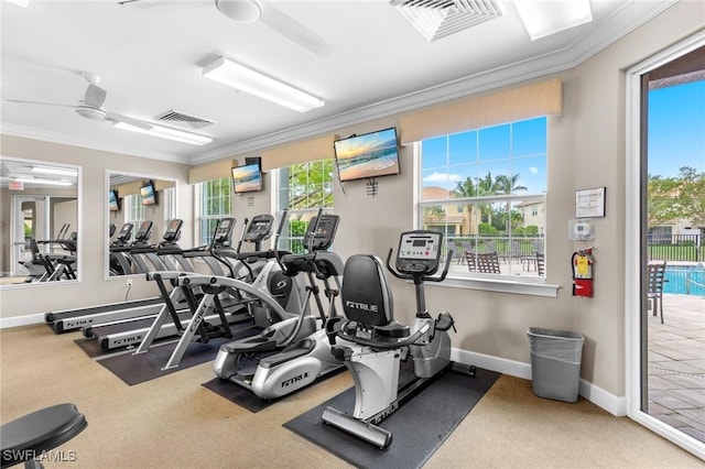 10844 Alvara Point Dr, Bonita Springs, FL 34135 - gym featuring crown molding, ceiling fan, baseboards, and carpet
