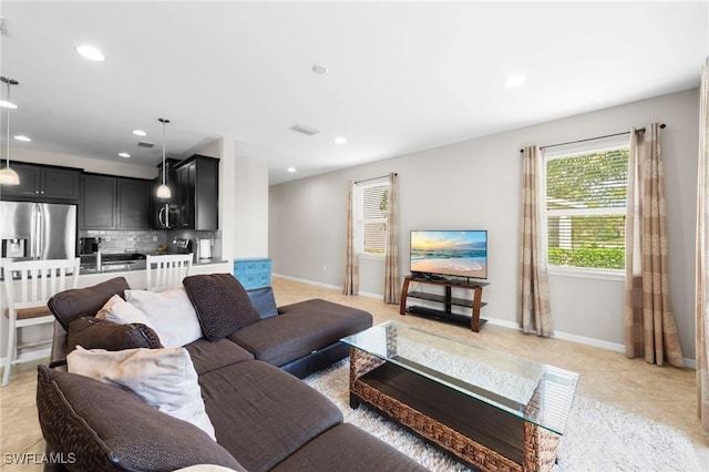 10844 Alvara Point Dr, Bonita Springs, FL 34135 - living room featuring recessed lighting and baseboards