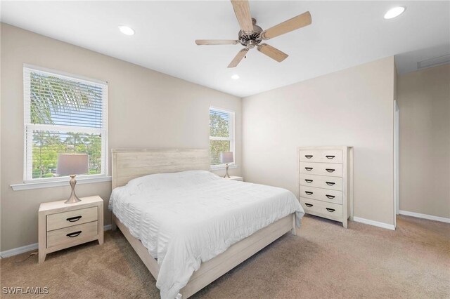 10844 Alvara Point Dr, Bonita Springs, FL 34135 - bedroom featuring multiple windows, carpet flooring, recessed lighting, and baseboards