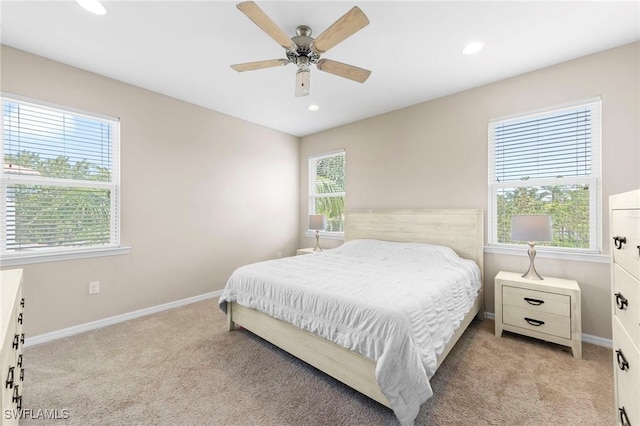 10844 Alvara Point Dr, Bonita Springs, FL 34135 - bedroom with light carpet, baseboards, recessed lighting, and a ceiling fan