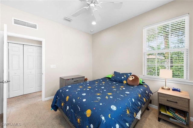 10844 Alvara Point Dr, Bonita Springs, FL 34135 - carpeted bedroom with baseboards, ceiling fan, and a closet