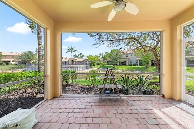 10844 Alvara Point Dr, Bonita Springs, FL 34135 - unfurnished sunroom featuring a ceiling fan