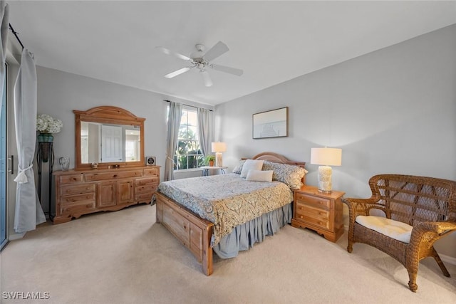 4410 Riverwatch Dr Unit 102, Bonita Springs, FL 34134 - bedroom featuring light carpet and a ceiling fan