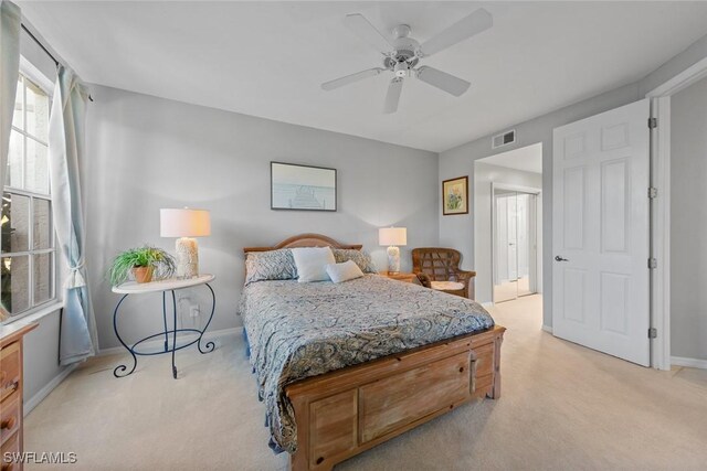 4410 Riverwatch Dr Unit 102, Bonita Springs, FL 34134 - bedroom with light colored carpet, baseboards, and a ceiling fan