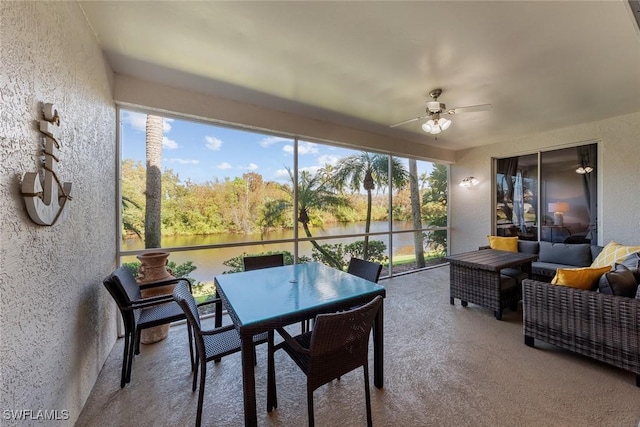 4410 Riverwatch Dr Unit 102, Bonita Springs, FL 34134 - sunroom featuring a ceiling fan, a water view, outdoor dining space, and outdoor lounge area