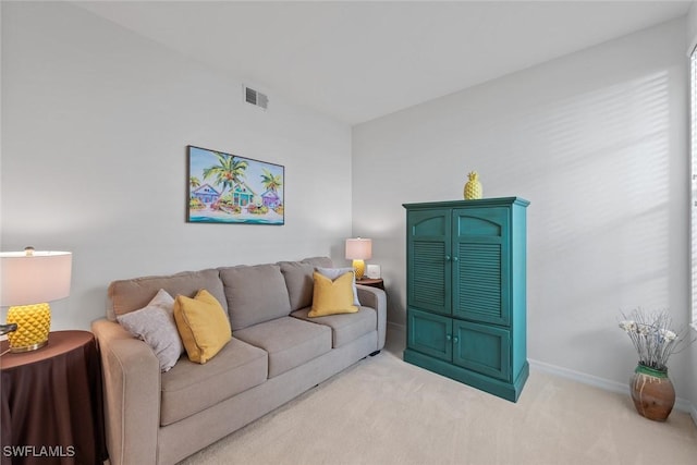 4410 Riverwatch Dr Unit 102, Bonita Springs, FL 34134 - living area featuring light colored carpet and baseboards