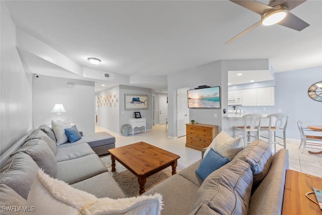 4410 Riverwatch Dr Unit 102, Bonita Springs, FL 34134 - living area with a ceiling fan