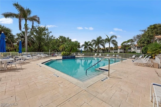 4410 Riverwatch Dr Unit 102, Bonita Springs, FL 34134 - community pool featuring a patio