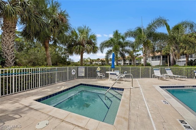 4410 Riverwatch Dr Unit 102, Bonita Springs, FL 34134 - view of pool featuring a patio area