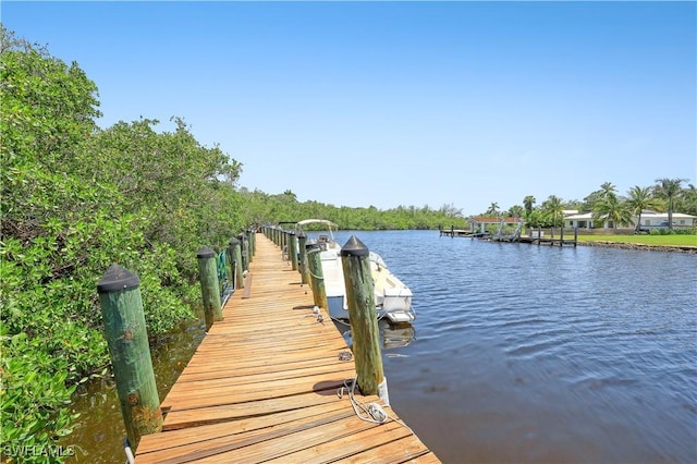 2249 Anchorage Ln Unit B, Naples, FL 34104 - dock area featuring a water view