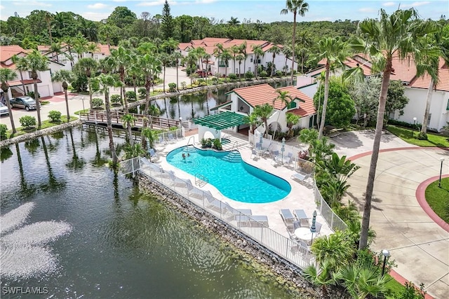 2249 Anchorage Ln Unit B, Naples, FL 34104 - community pool featuring a water view and a residential view