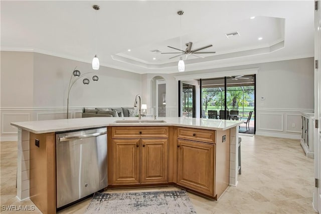 12732 Kinross Ln, Naples, FL 34120 - kitchen with dishwasher, a sink, a decorative wall, a tray ceiling, and ceiling fan