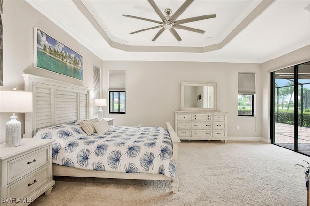 12732 Kinross Ln, Naples, FL 34120 - bedroom with access to outside, a tray ceiling, light carpet, ornamental molding, and baseboards