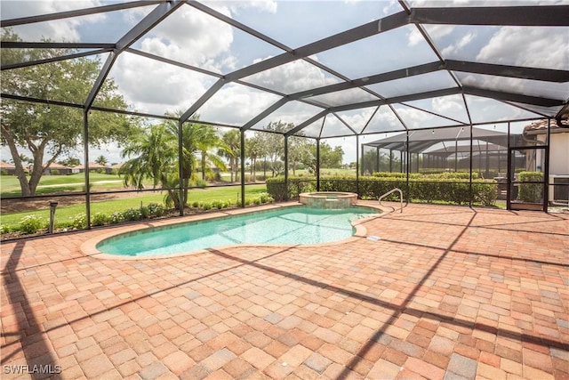 12732 Kinross Ln, Naples, FL 34120 - view of pool with a patio area, a pool with connected hot tub, and a lanai