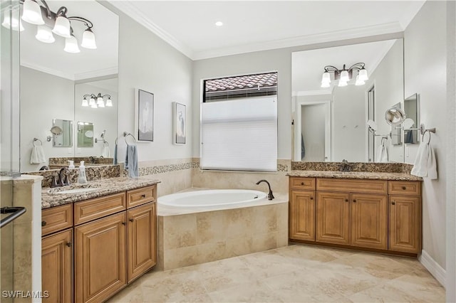 12732 Kinross Ln, Naples, FL 34120 - bathroom with two vanities, a bath, and crown molding