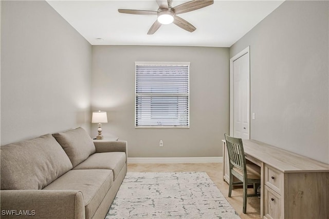 12732 Kinross Ln, Naples, FL 34120 - home office with a ceiling fan and baseboards