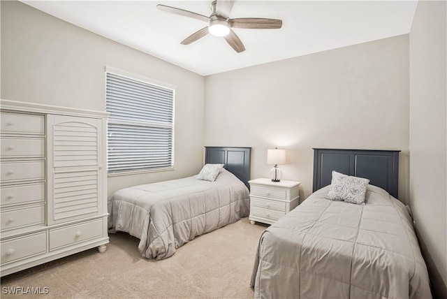 12732 Kinross Ln, Naples, FL 34120 - carpeted bedroom with ceiling fan