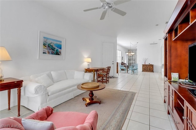 8515 Chase Preserve Dr, Naples, FL 34113 - living area with a chandelier, light tile patterned floors, and a ceiling fan