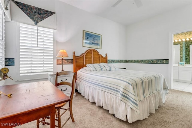 8515 Chase Preserve Dr, Naples, FL 34113 - bedroom featuring light colored carpet, connected bathroom, and ceiling fan