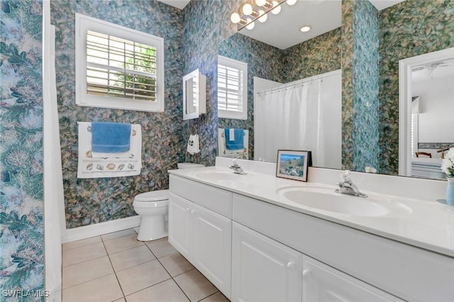 8515 Chase Preserve Dr, Naples, FL 34113 - full bath featuring tile patterned floors, double vanity, toilet, baseboards, and a shower with shower curtain
