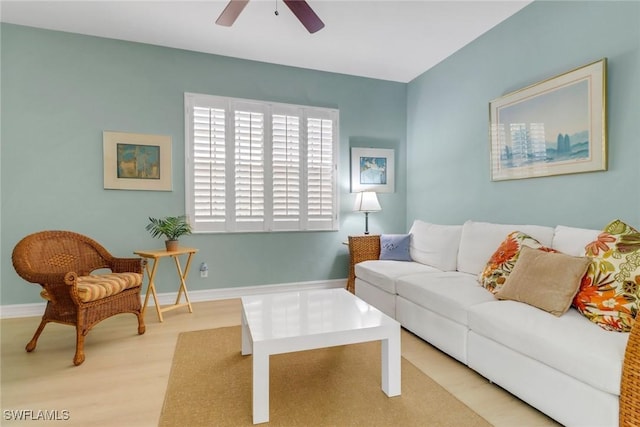 8515 Chase Preserve Dr, Naples, FL 34113 - living room with ceiling fan and wood finished floors