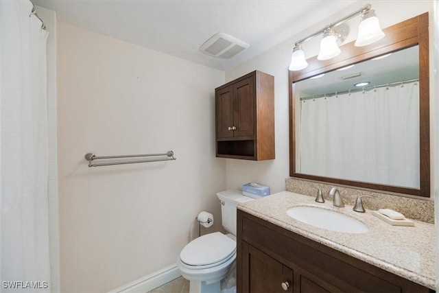 5964 Pelican Bay Blvd Unit 415, Naples, FL 34108 - bathroom featuring toilet, vanity, and a shower with shower curtain