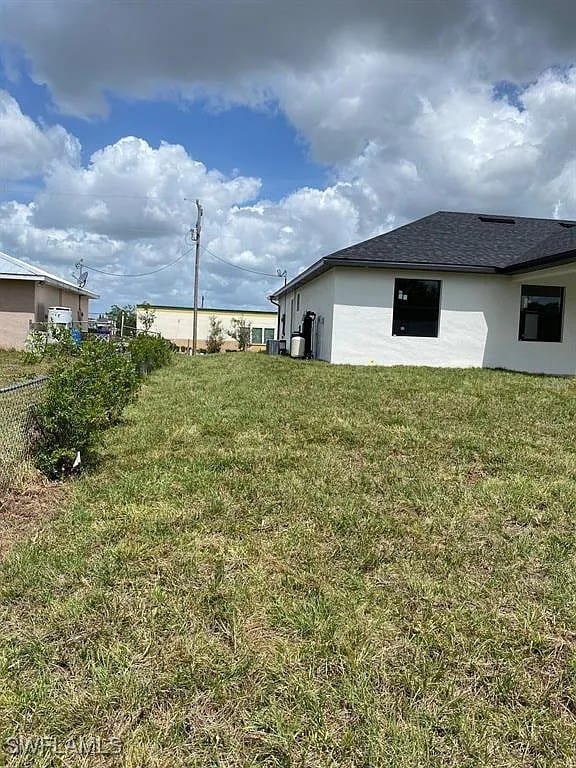 3017 4th St W, Lehigh Acres, FL 33971 - view of yard