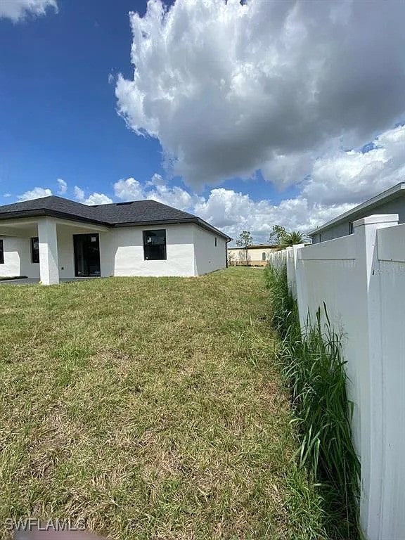 3017 4th St W, Lehigh Acres, FL 33971 - view of yard