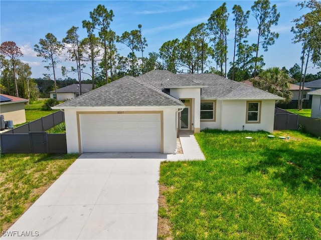 3507 41st St SW, Lehigh Acres, FL 33976 - view of front facade with stucco siding, a garage, concrete driveway, and a shingled roof