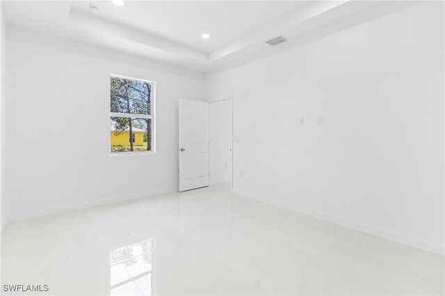 3507 41st St SW, Lehigh Acres, FL 33976 - unfurnished room featuring recessed lighting, a raised ceiling, and baseboards
