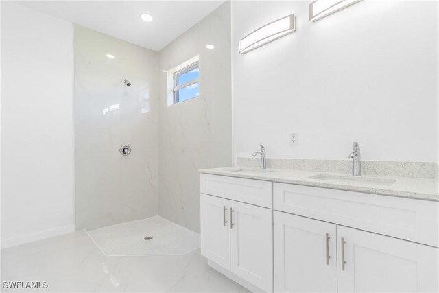 3507 41st St SW, Lehigh Acres, FL 33976 - bathroom featuring a marble finish shower, marble finish flooring, and double vanity