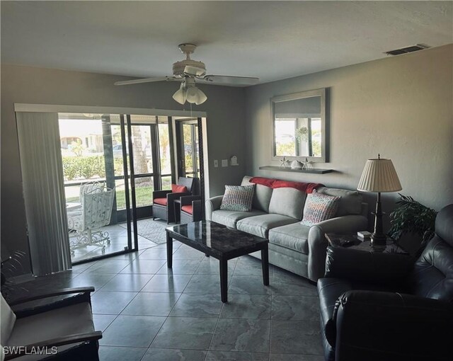 11460 Caravel Cir Unit 5009, Fort Myers, FL 33908 - tiled living area with a ceiling fan
