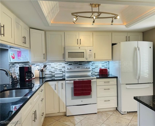 11460 Caravel Cir Unit 5009, Fort Myers, FL 33908 - kitchen with white appliances, a raised ceiling, a sink, ornamental molding, and decorative backsplash