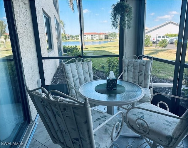11460 Caravel Cir Unit 5009, Fort Myers, FL 33908 - sunroom / solarium with a water view