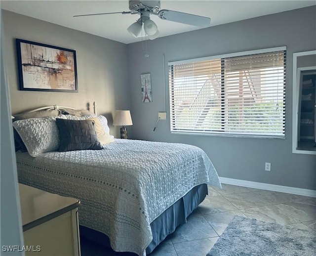 11460 Caravel Cir Unit 5009, Fort Myers, FL 33908 - bedroom featuring baseboards and a ceiling fan