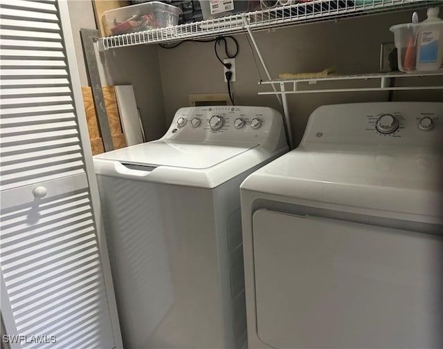 11460 Caravel Cir Unit 5009, Fort Myers, FL 33908 - laundry room featuring independent washer and dryer