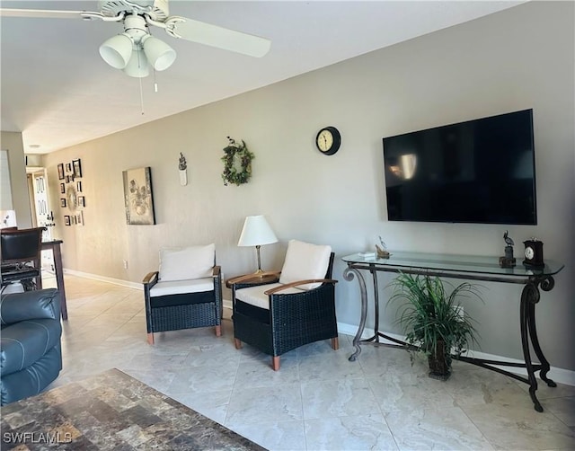 11460 Caravel Cir Unit 5009, Fort Myers, FL 33908 - living room featuring a ceiling fan and baseboards