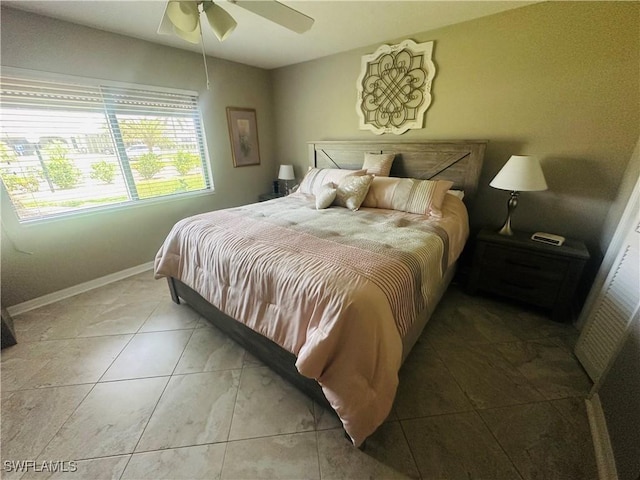11460 Caravel Cir Unit 5009, Fort Myers, FL 33908 - bedroom featuring baseboards, tile patterned floors, and ceiling fan